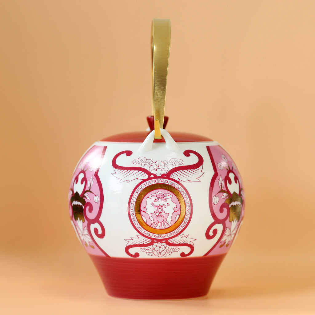 Old Imari floral pattern teapot, wine red.
