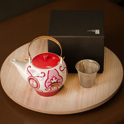 Old Imari floral pattern teapot, wine red.